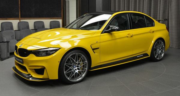 Желтый BMW M3 с капотом и спойлером от M4 GTS представлен в Abu Dhabi