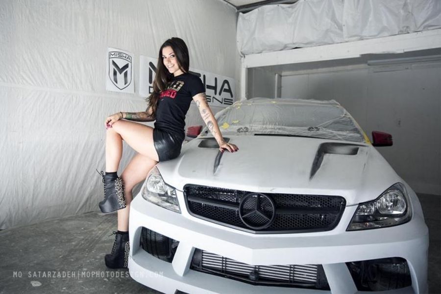 Mercedes-Benz and tattoed girl